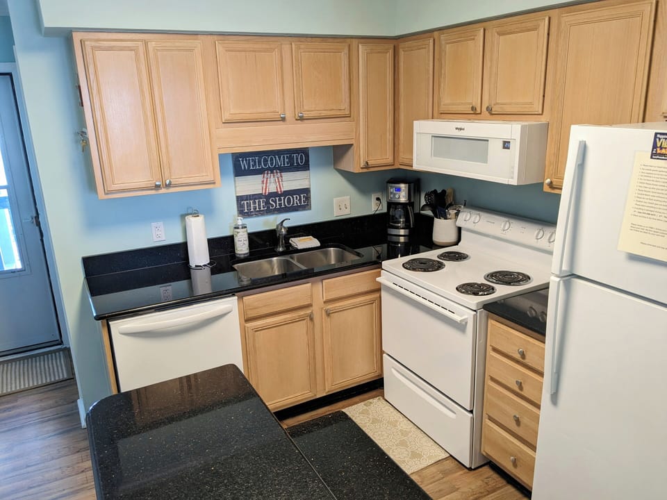 Cooking basics such as pots and pans, wine glasses, blender, drip, coffee maker