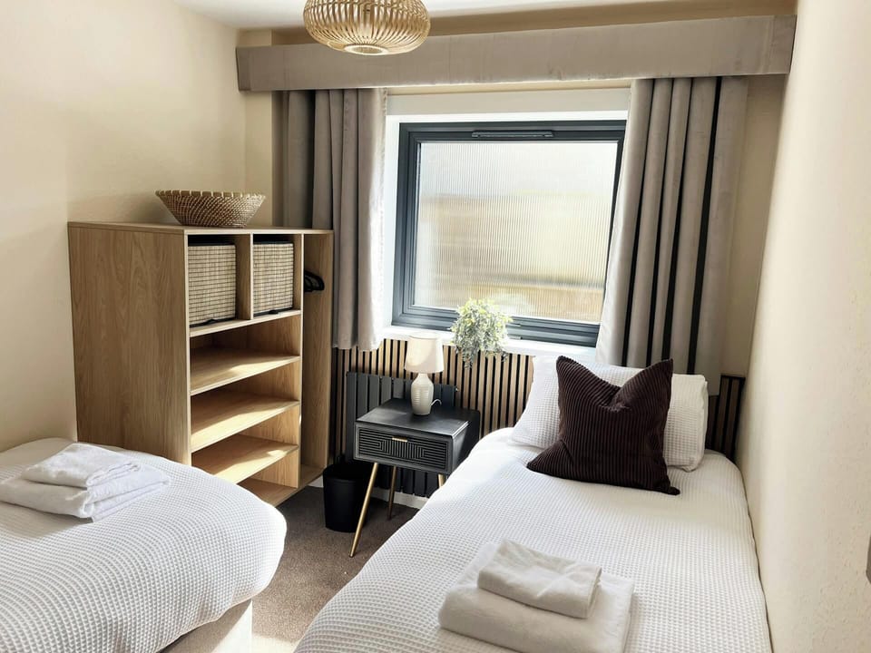 Twin bedroom with two single beds