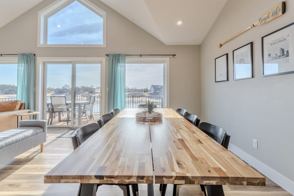 Upstairs dining table seats eight and the island seats six.