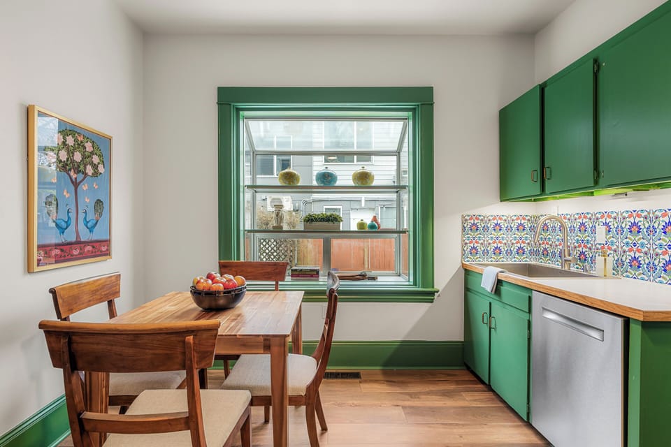 Extra dining table comfortably sits four.