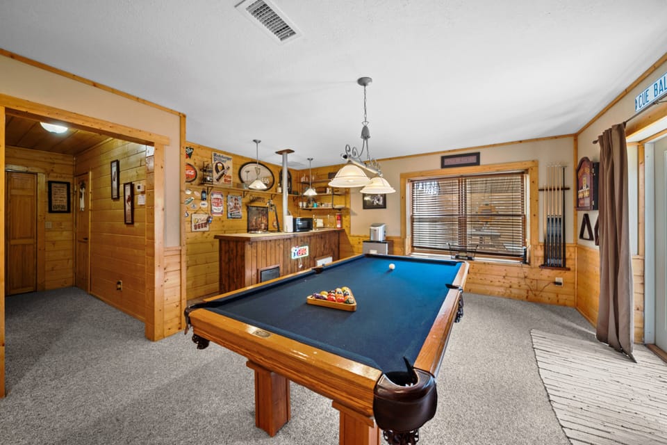 Family Room has a Pool Table, Darts, and a Bar