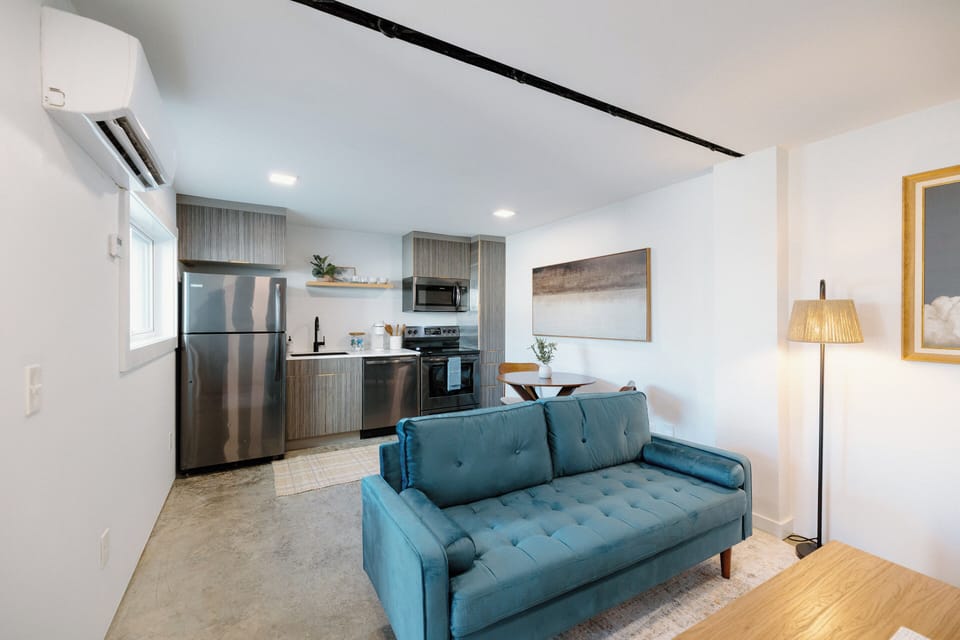 Open‑concept living space designed for comfort and convenience, blending modern décor with coastal touches in the heart of Wilmington's creative Cargo District.