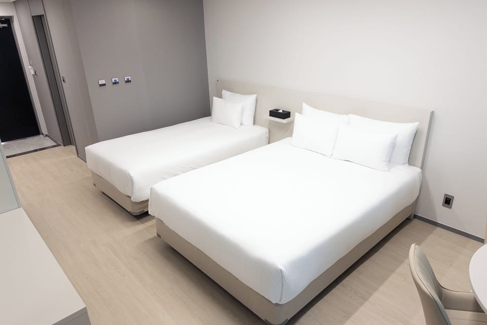 Family Twin Room, Balcony, Partial Ocean View | Desk, free WiFi