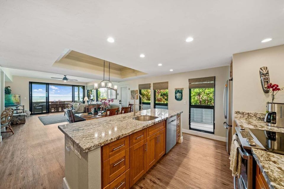 Spacious kitchen with plenty of counter space and a seamless flow into the dining area