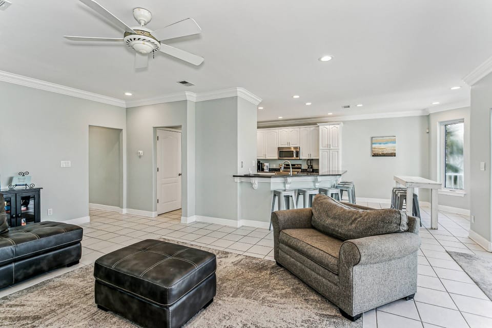 The large living room is open to the kitchen and dining area