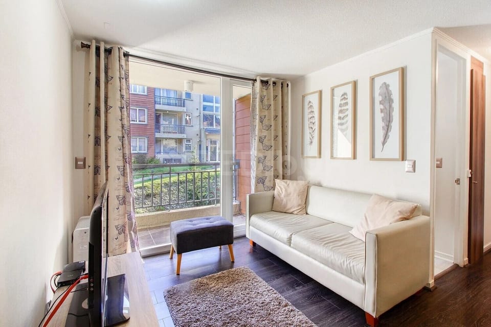 Standard Apartment | Living area | 42-inch Smart TV with digital channels