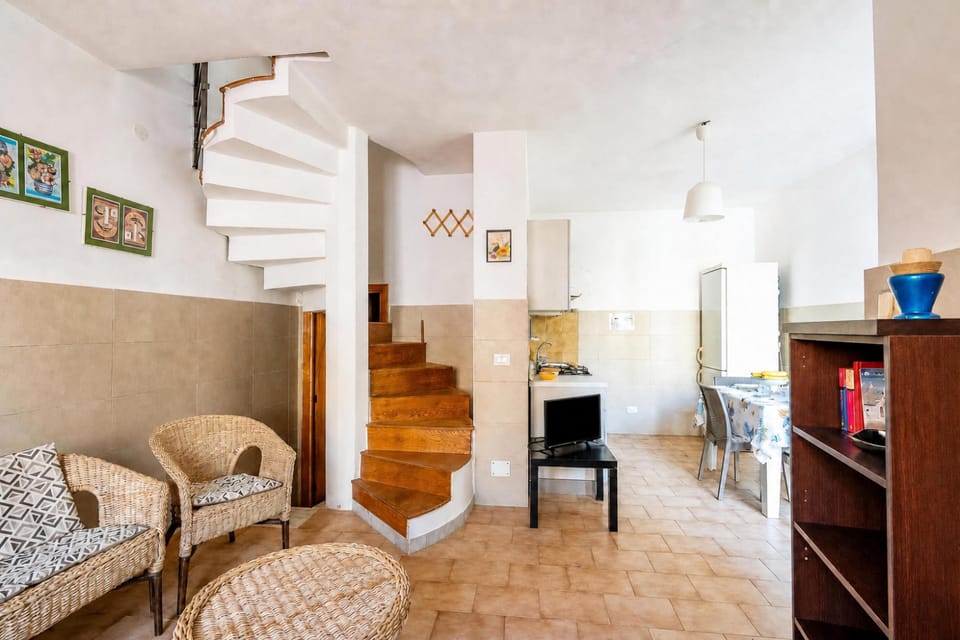 Family House, 2 Bedrooms, 2 Bathrooms (Villino Sole 3 with A/C near Beach &) | Living area | Flat-screen TV