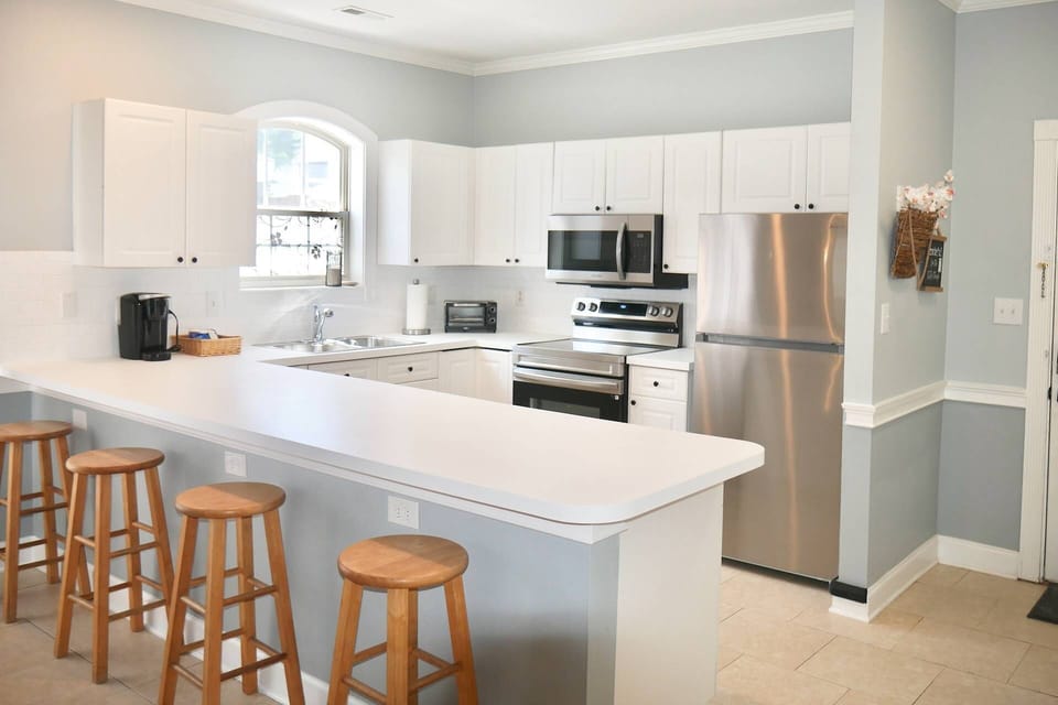 Brand new stainless steel appliances including Dishwasher + Coffee + Toaster Oven.