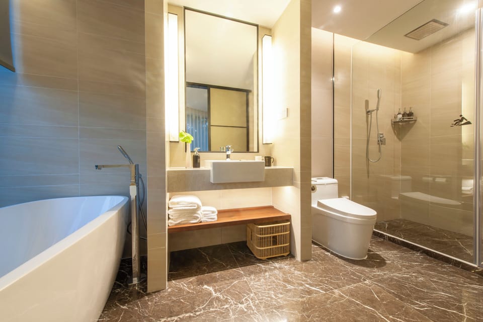 Japanese-style Quadruple Room, Multiple Beds | Bathroom | Shower, rainfall showerhead, hair dryer, bathrobes