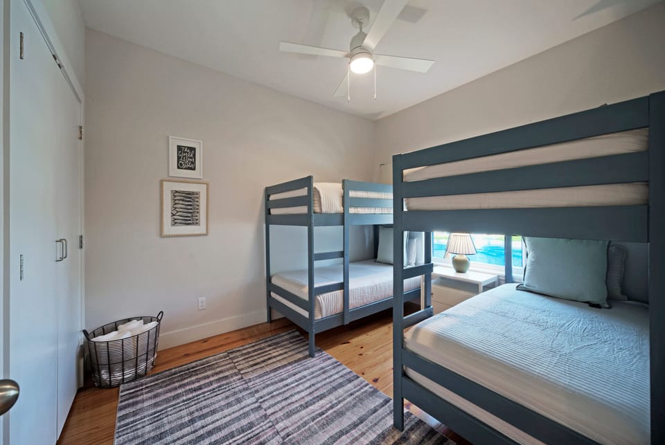 Bedroom 3 features 2 sets of twin bunk beds. 