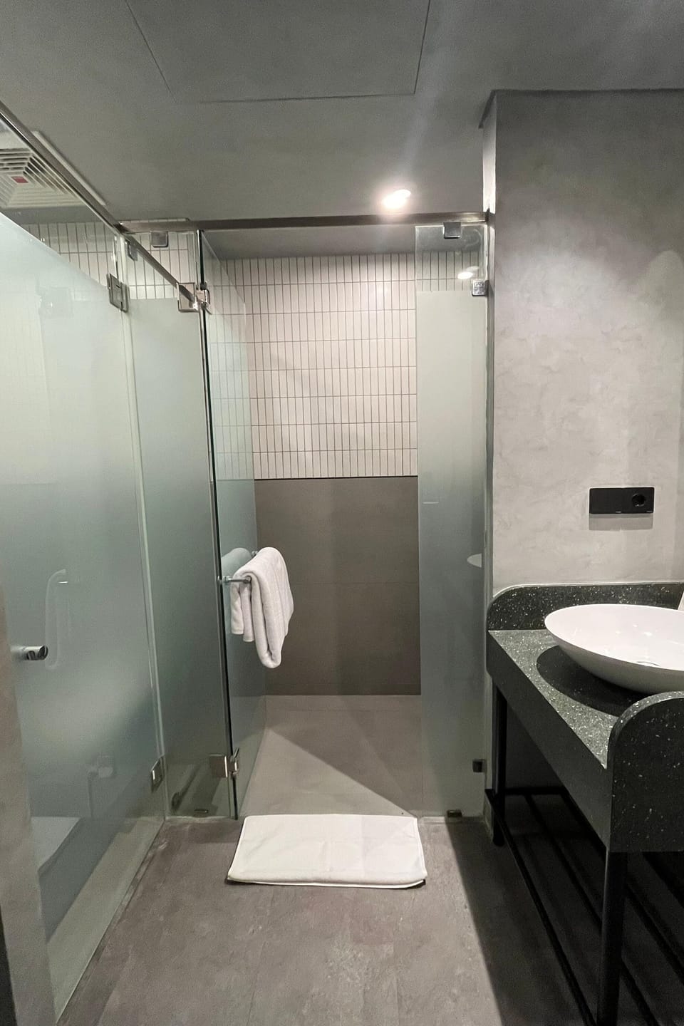 Shower, free toiletries, hair dryer, slippers