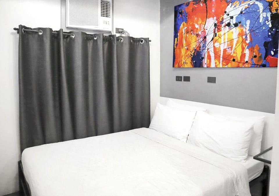 Deluxe Queen Room | Laptop workspace, iron/ironing board, free WiFi