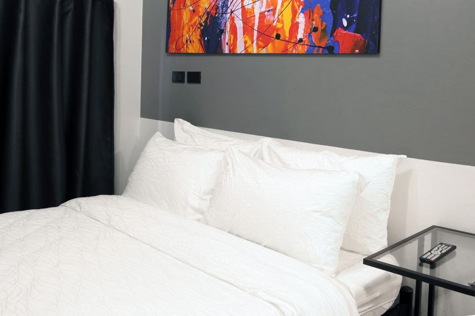 Deluxe Queen Room | Laptop workspace, iron/ironing board, free WiFi