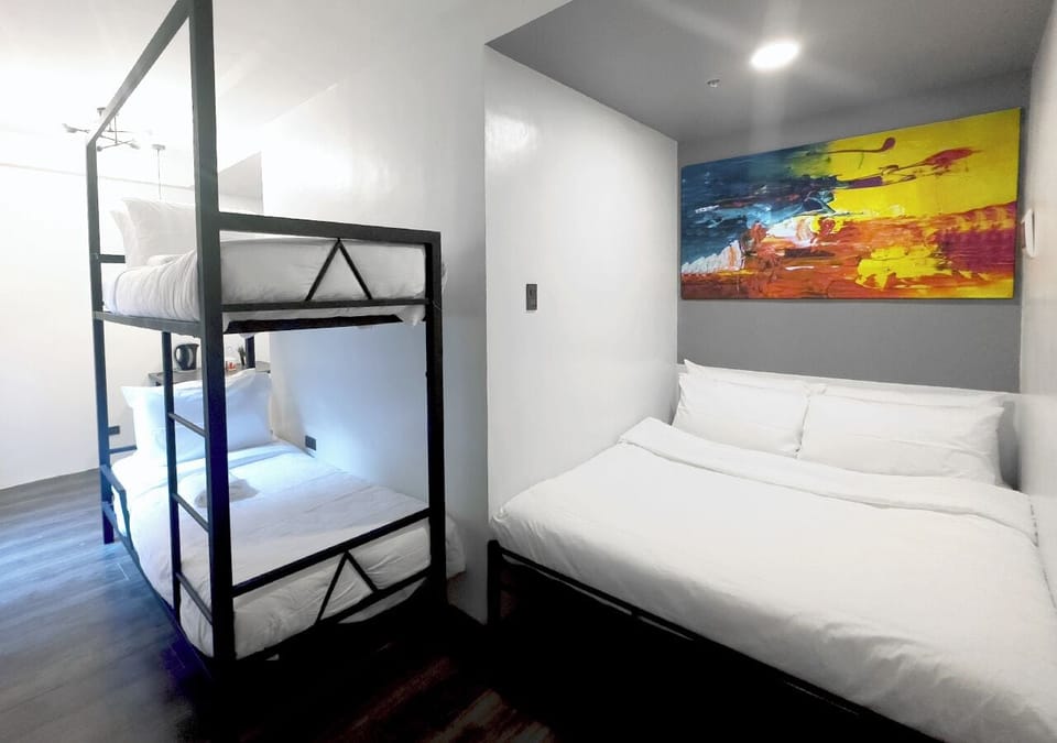 Garden Suite | Desk, laptop workspace, blackout drapes, iron/ironing board