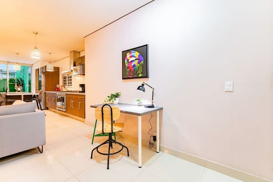 For the remote worker or student, there’s a desk and chair perfect for working on the laptop