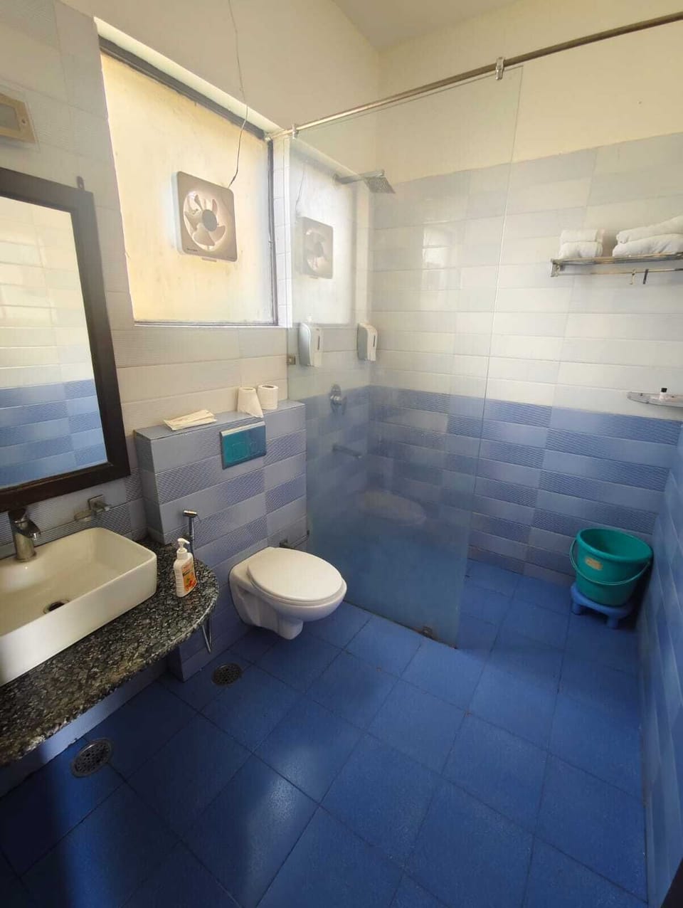 Shower, towels, soap, shampoo