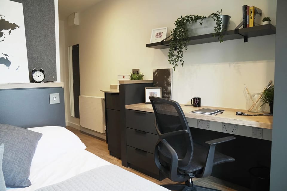 Classic Studio | Desk, laptop workspace, iron/ironing board