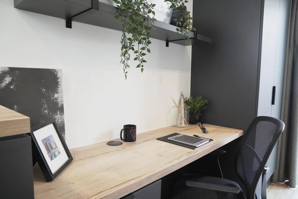 Classic Studio | Desk, laptop workspace, iron/ironing board