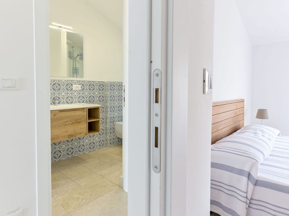 Flooring, Floor, Wall, Wood, Interior Design, Home, Lighting, Door, Room, Ceiling
