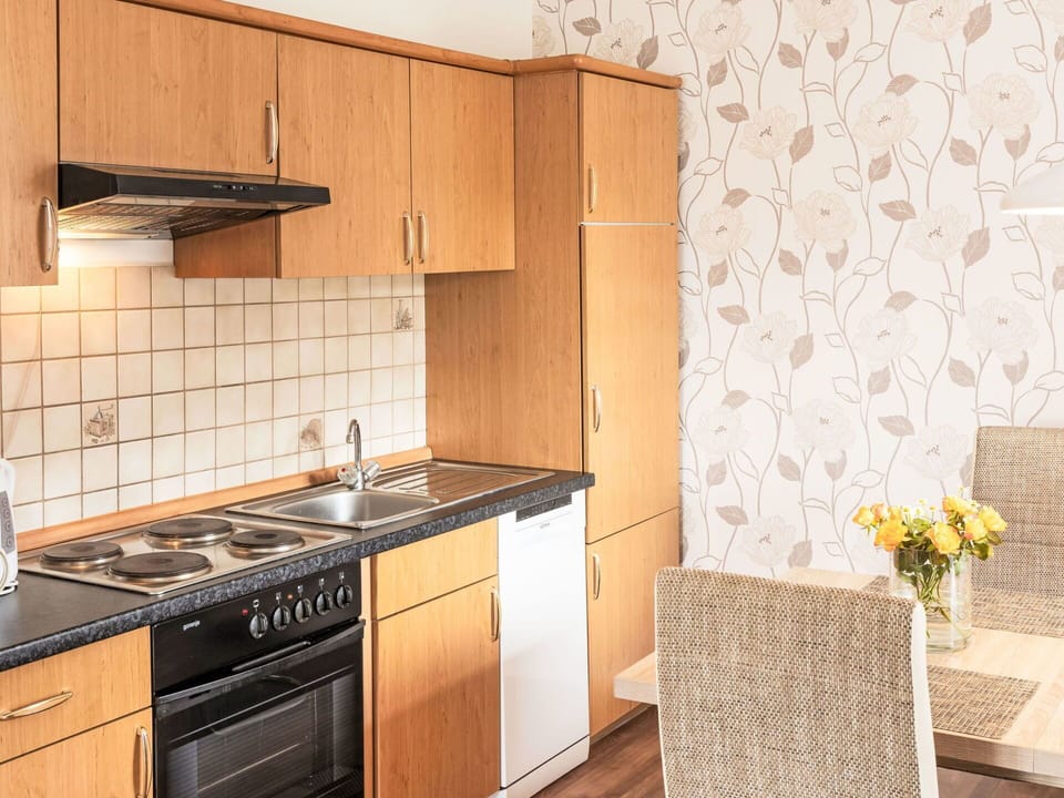 Furniture, Interior Design, Wood, Flooring, Floor, Cabinetry, Kitchen, Sink, Lighting, Countertop