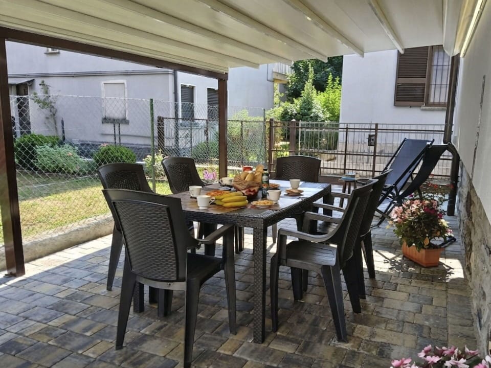 Furniture, Table, Chair, Outdoor Furniture, Outdoor Table, Kitchen & Dining Room Table, Shade, Outdoor Structure, Flowerpot, Houseplant