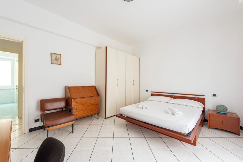Apartment, 3 Bedrooms, Balcony | 3 bedrooms, desk, laptop workspace, iron/ironing board
