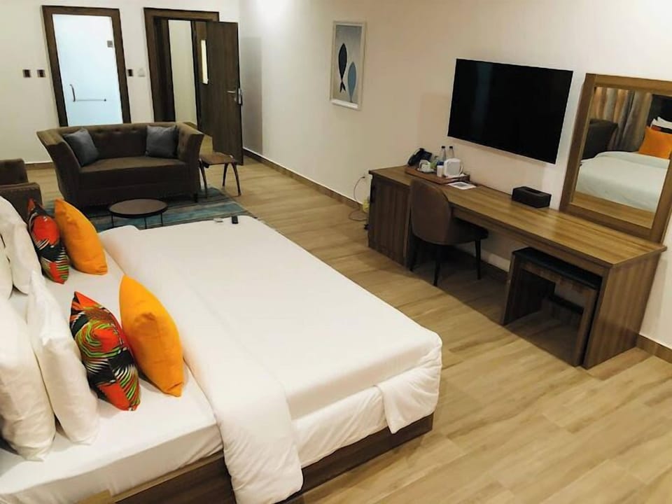 Deluxe Room, Balcony, City View | Desk, laptop workspace, blackout drapes, soundproofing
