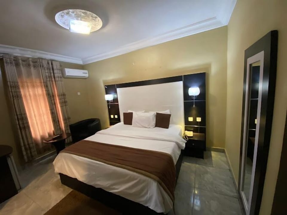 Deluxe Room, Balcony, City View | Desk, laptop workspace, blackout drapes, soundproofing