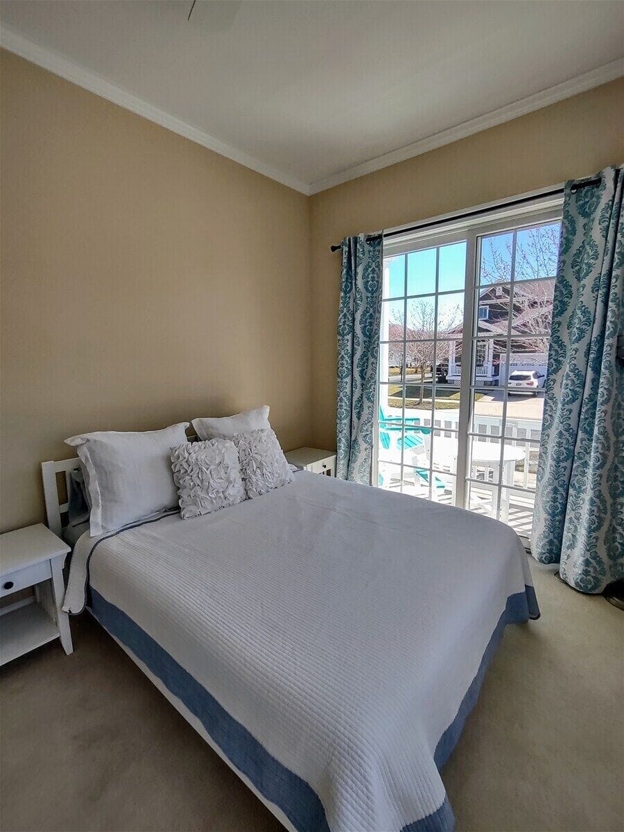 Main Floor: 1 Queen, full bath outside in hallway