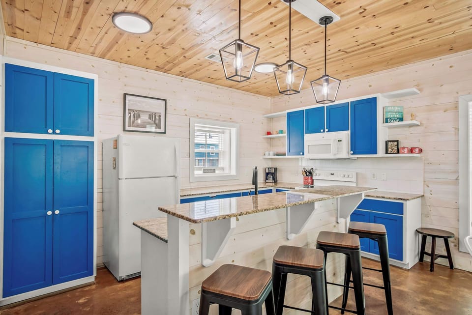 Sip morning coffee or grab a bite at the coastal counter, seating 4