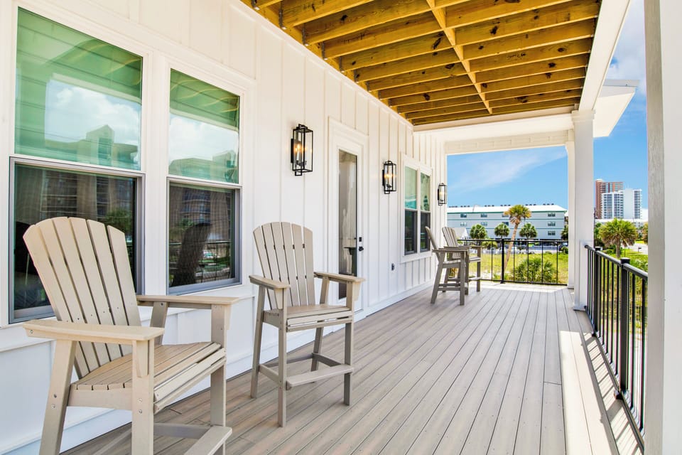 Balcony access with Gulf views on the main floor, between Guest bedrooms 1 and 2