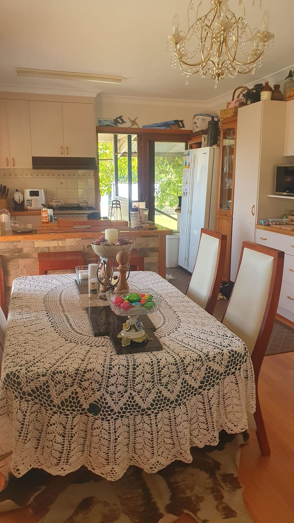Dining for 6 people,  plus bar stools for 3 people. 