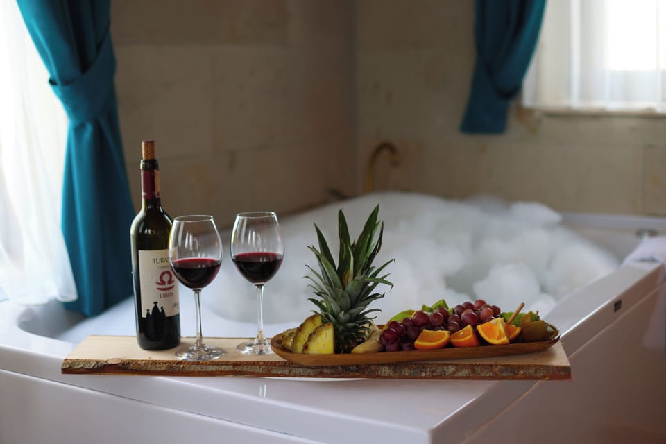 Deluxe Triple Room, City View | Bathroom | Separate tub and shower, free toiletries, hair dryer, slippers