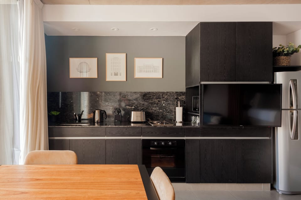 Comfort Studio, Balcony, City View | Private kitchen | Coffee/tea maker, electric kettle