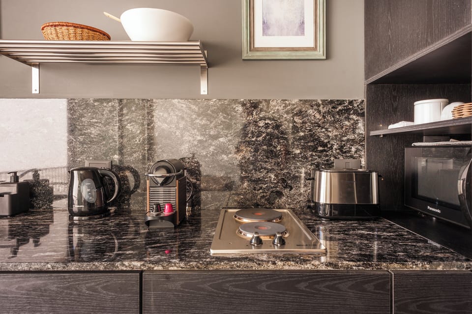 Comfort Studio, Balcony, Pool View | Private kitchen | Microwave, oven, stovetop, coffee/tea maker