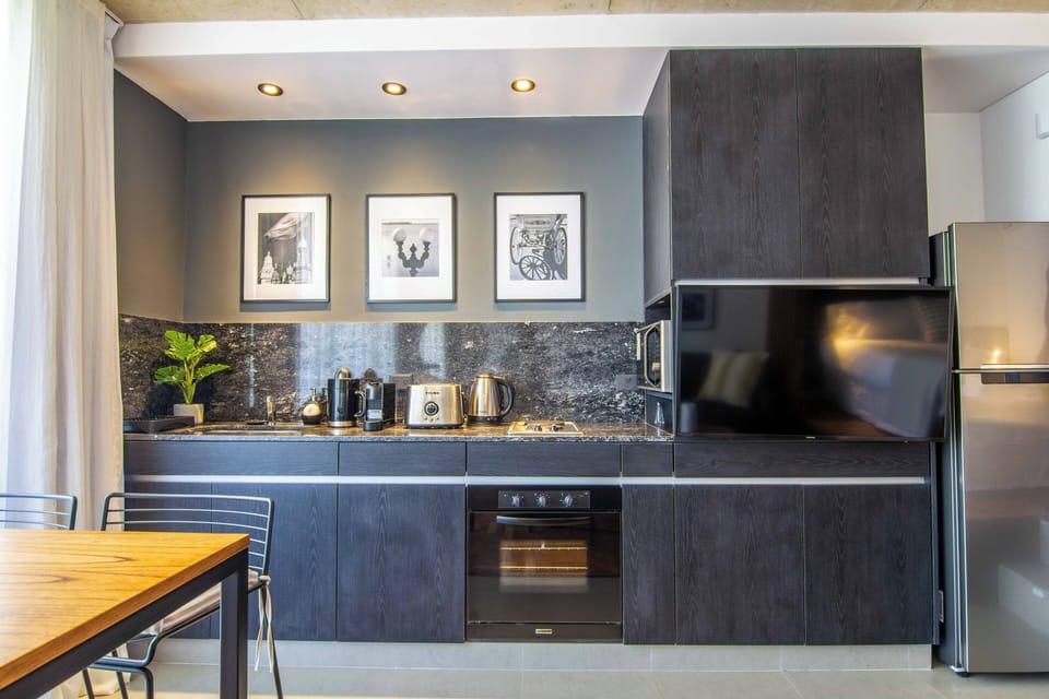 Superior Studio, Balcony, City View | Private kitchen | Microwave, oven, stovetop, coffee/tea maker