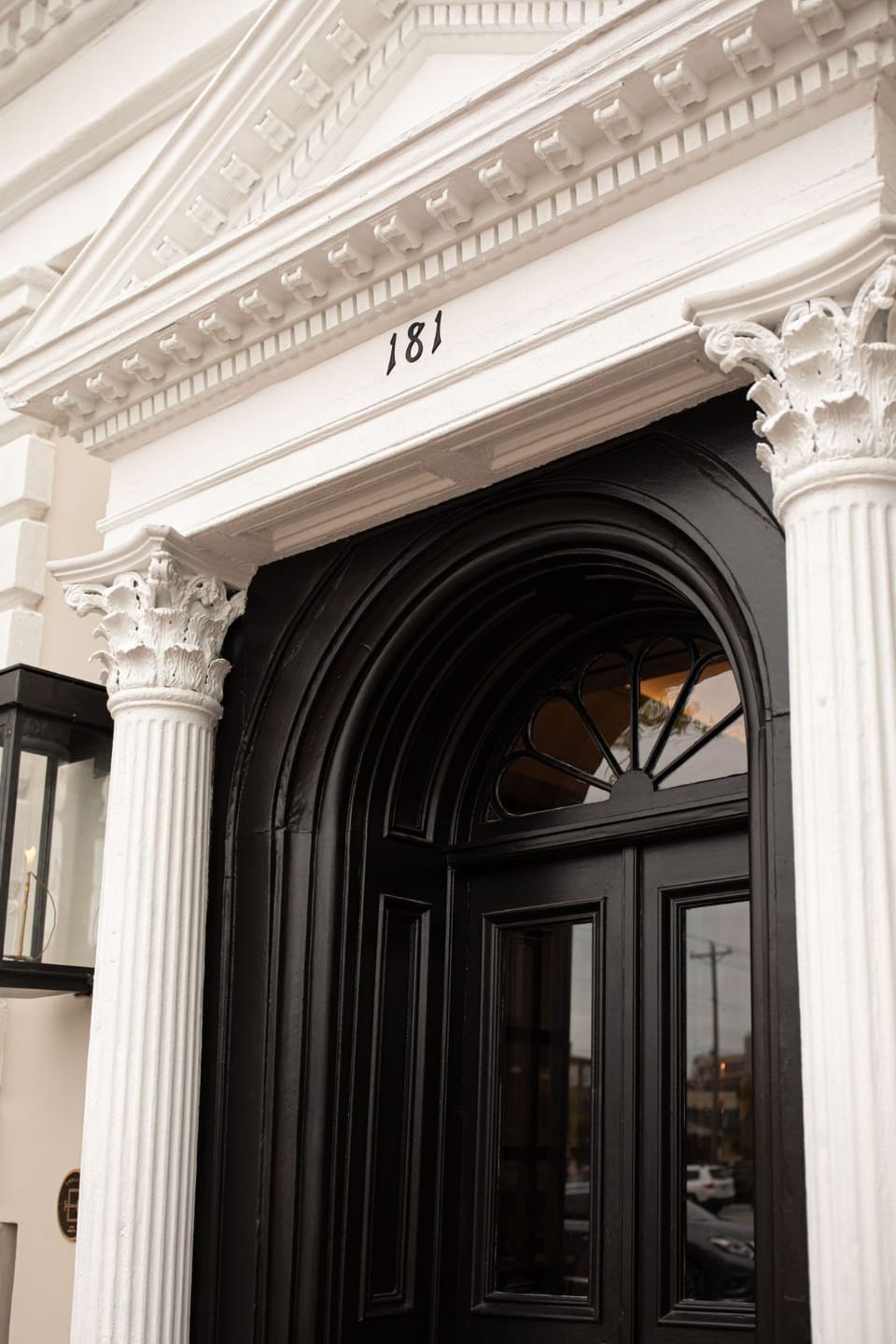 Timeless architectural elegance, with intricate details and a grand entryway that exudes classic sophistication.