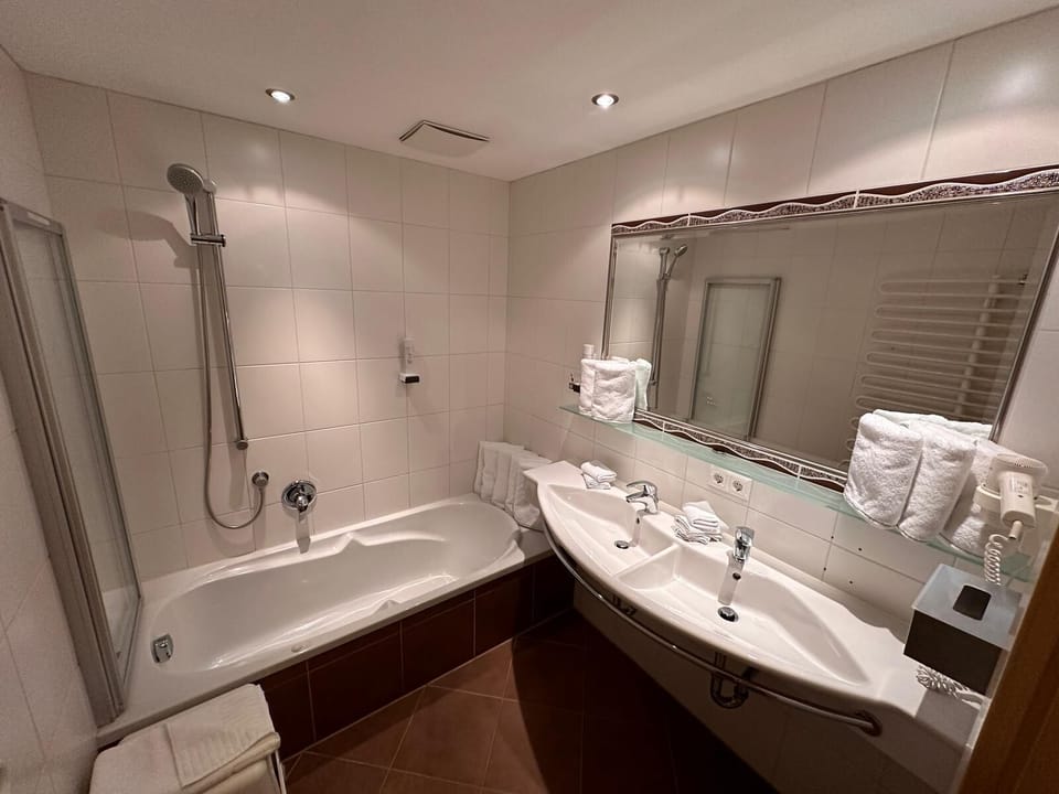 Hair dryer, towels, soap, shampoo