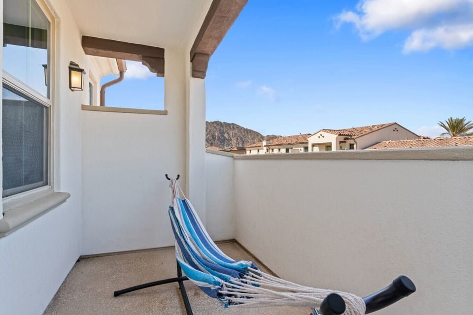 Covered balcony w/ hammock chair & mountain views for laid-back lounging