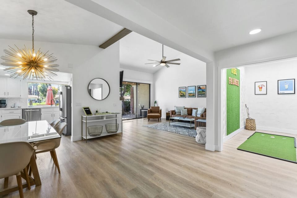Bright open-concept living space w/ high ceilings & seamless flow between rooms