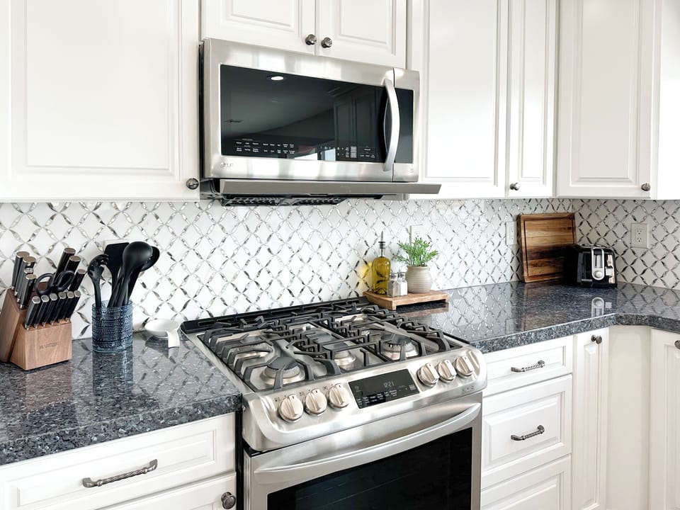 Chef's kitchen with gas range.