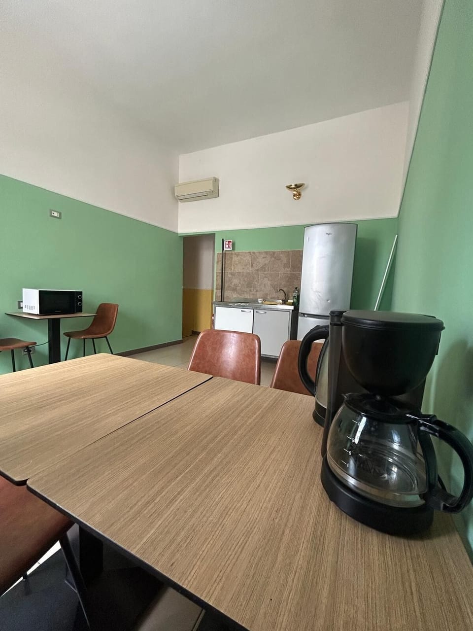 Superior Shared Dormitory, City View | Private kitchen | Cookware/dishes/utensils, cleaning supplies, kitchen island
