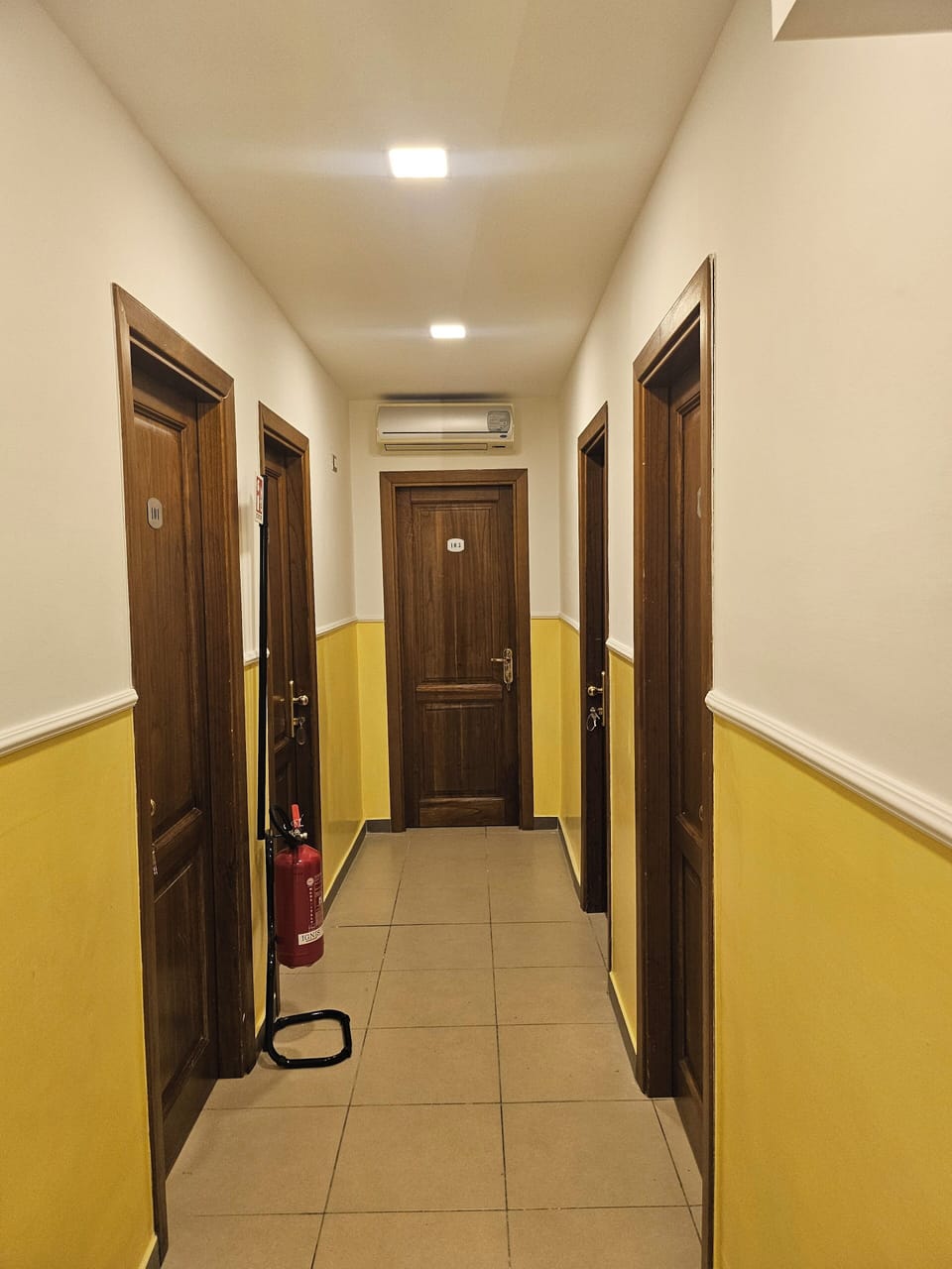 Economy Room | Living area | 32-inch LCD TV with satellite channels