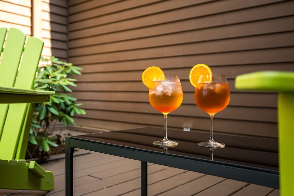 The first sip of your stay—pull up a chair and soak it in.
