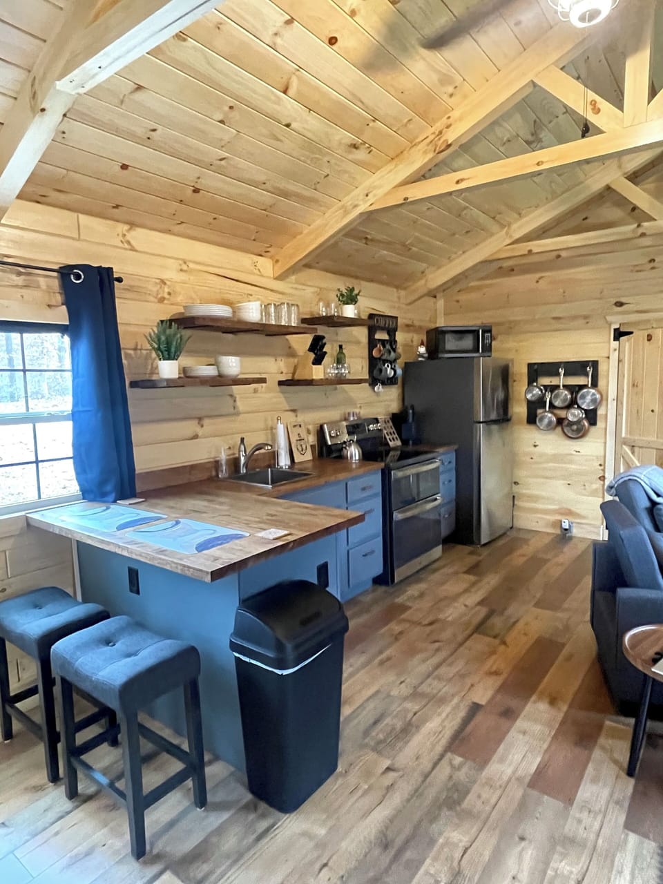 Full kitchen and small bar top.