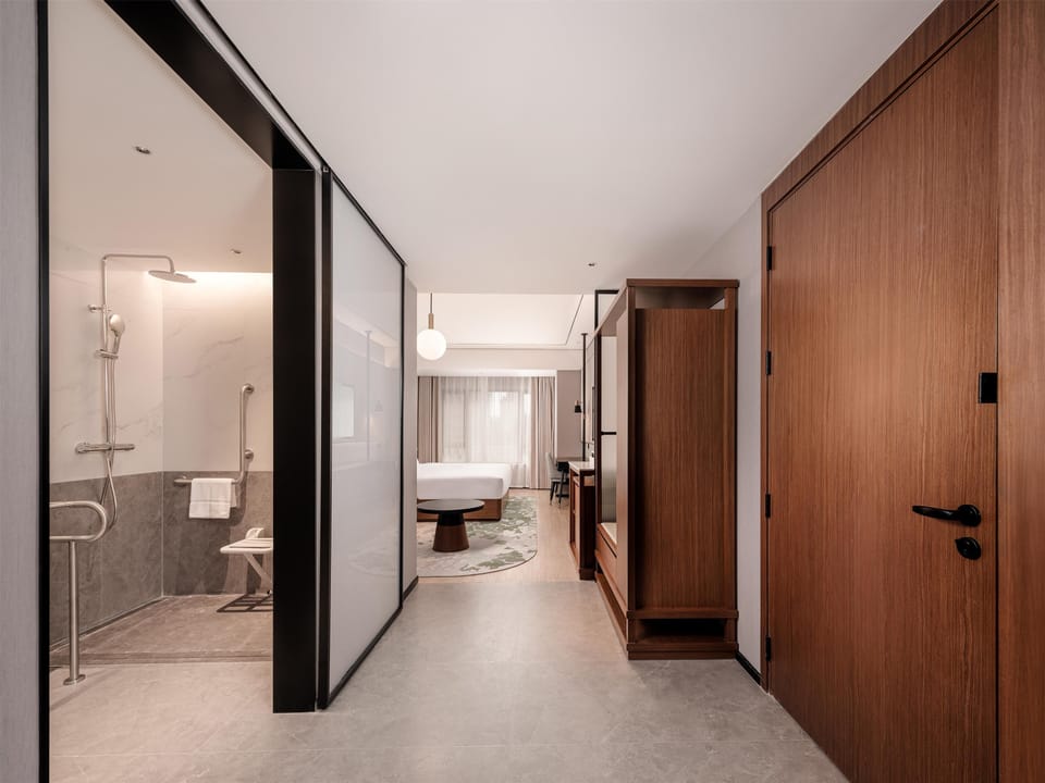 Room, 1 King Bed, Accessible | Bathroom | Shower, slippers, towels