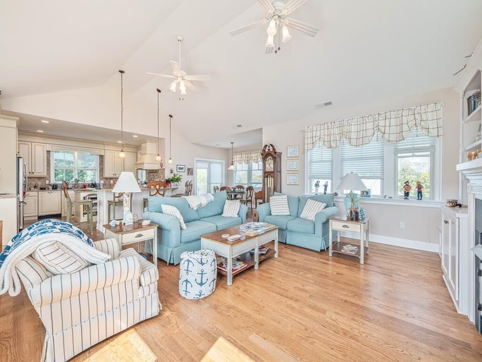 Seamless flow between the living, dining, and kitchen areas, creating a perfect space for entertaining.