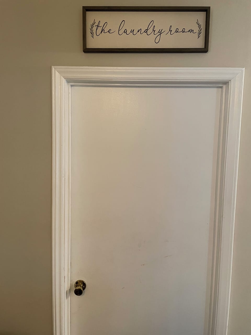 Washer and dryer behind this door.