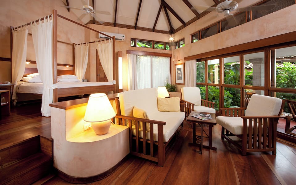 Bungalow, with AC | Down comforters, pillowtop beds, in-room safe, individually decorated