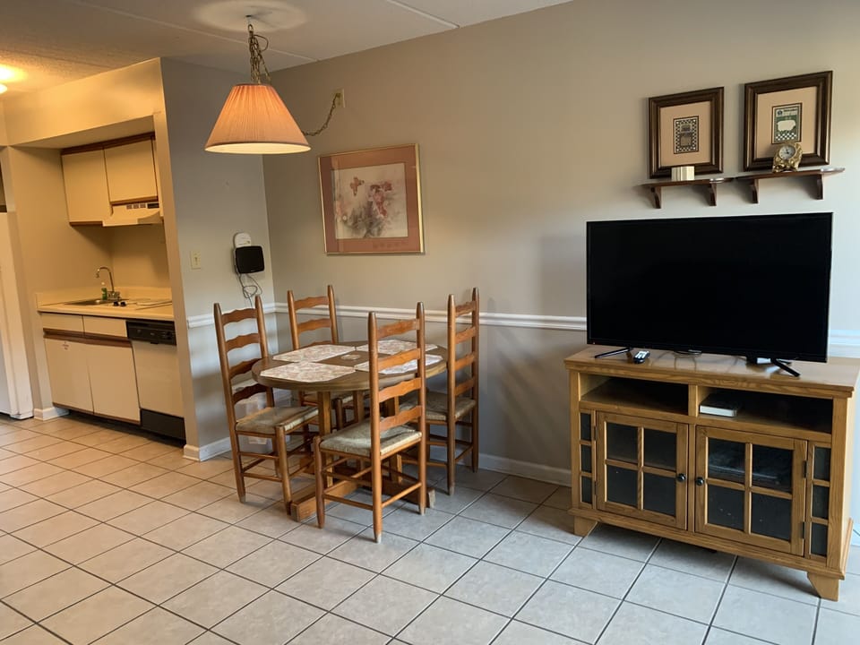 Condo, 1 Bedroom (304) | Living area | TV, fireplace